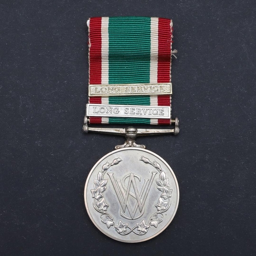 495 - A SECOND WORLD WAR EMPIRE MEDAL GROUP OF FOUR TO THE WOMEN'S VOLUNTARY SERVICE. A George VI British ... 