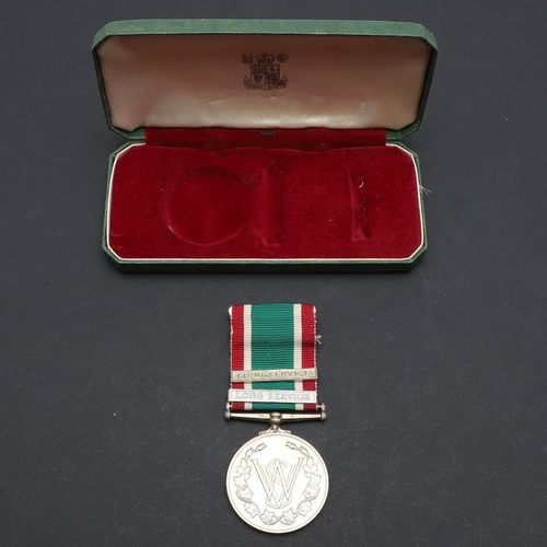 495 - A SECOND WORLD WAR EMPIRE MEDAL GROUP OF FOUR TO THE WOMEN'S VOLUNTARY SERVICE. A George VI British ... 