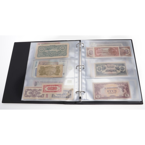 559 - TWO ALBUMS OF WORLD BANKNOTES. Approximately 132 World Banknotes to include notes from America, Keny... 