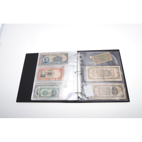 559 - TWO ALBUMS OF WORLD BANKNOTES. Approximately 132 World Banknotes to include notes from America, Keny... 