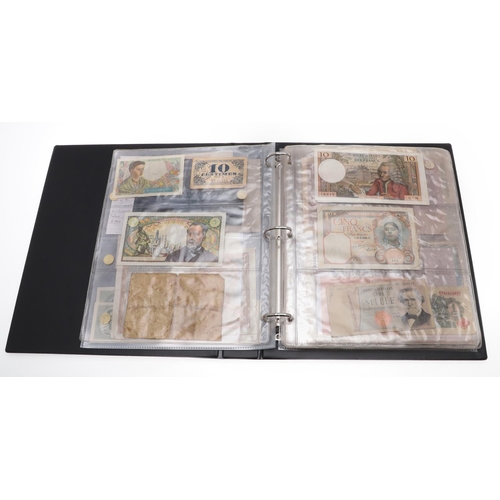 559 - TWO ALBUMS OF WORLD BANKNOTES. Approximately 132 World Banknotes to include notes from America, Keny... 