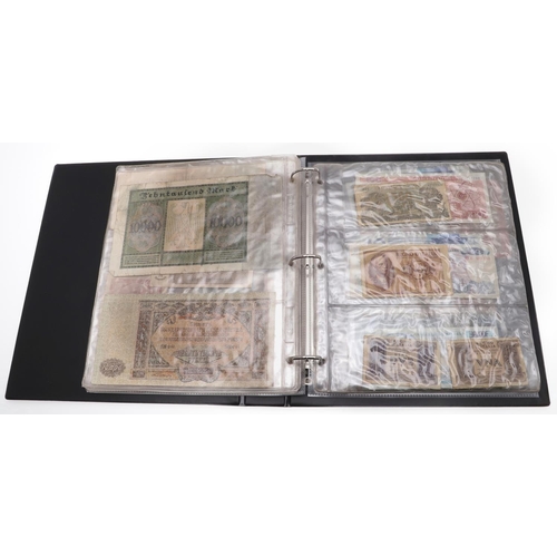 559 - TWO ALBUMS OF WORLD BANKNOTES. Approximately 132 World Banknotes to include notes from America, Keny... 