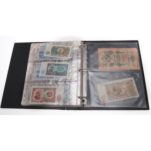 559 - TWO ALBUMS OF WORLD BANKNOTES. Approximately 132 World Banknotes to include notes from America, Keny... 