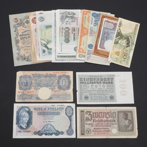 563 - A COLLECTION OF BANKNOTES TO INCLUDE GEORGE V UNITED KINGDOM NOTES AND OTHERS. A collection of bankn... 