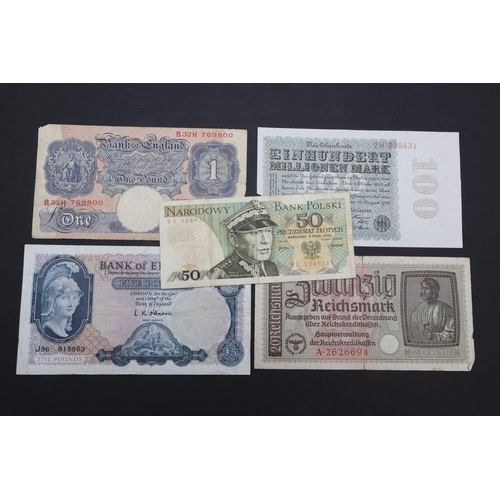 563 - A COLLECTION OF BANKNOTES TO INCLUDE GEORGE V UNITED KINGDOM NOTES AND OTHERS. A collection of bankn... 