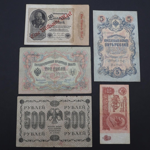 563 - A COLLECTION OF BANKNOTES TO INCLUDE GEORGE V UNITED KINGDOM NOTES AND OTHERS. A collection of bankn... 