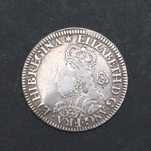 570 - AN ELIZABETH I MILLED SIXPENCE, 1562. An Elizabeth I Milled sixpence, Crowned bust r. with rose behi... 