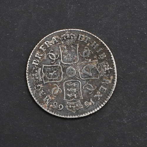 573 - A CHARLES II SHILLING, 1668. A George II Shilling, laureate and draped bust r. reverse with crucifor... 