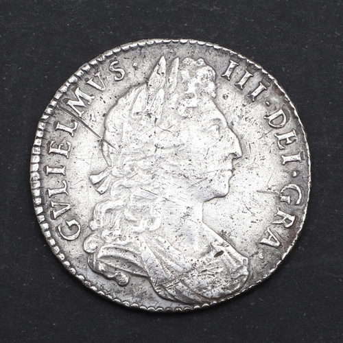 576 - A WILLIAM III HALFCROWN, 1697. William III Halfcrown, rim with 'Nono', the obverse laureate bust r. ... 