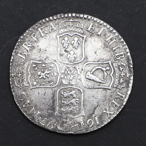 576 - A WILLIAM III HALFCROWN, 1697. William III Halfcrown, rim with 'Nono', the obverse laureate bust r. ... 