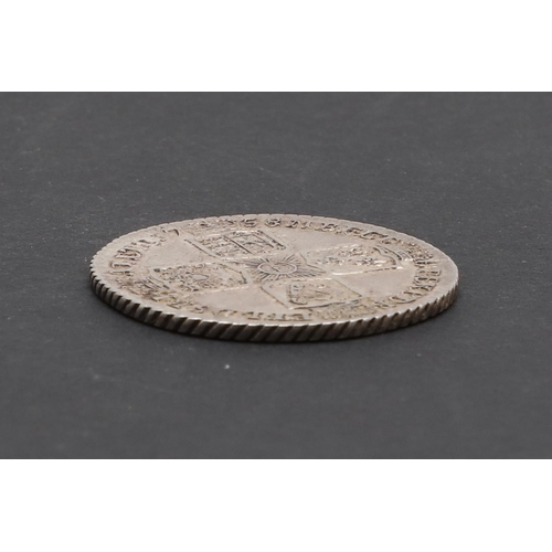 581 - A GEORGE II SHILLING, 1758. A George II Shilling, old laureate and draped bust l. Reverse with plain... 