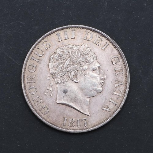 585 - A GEORGE III HALFCROWN, 1817. A George III Halfcrown, smaller laureate head r. with date 1817, rever... 