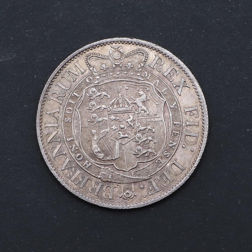 585 - A GEORGE III HALFCROWN, 1817. A George III Halfcrown, smaller laureate head r. with date 1817, rever... 