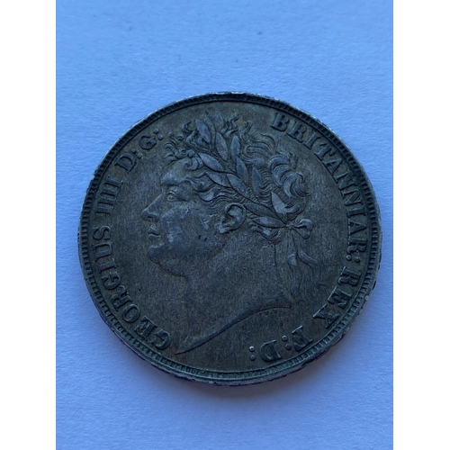 588 - A GEORGE IV CROWN, 1821. A George IV Crown. laureate bust l, reverse, George and the Dragon, dated 1... 