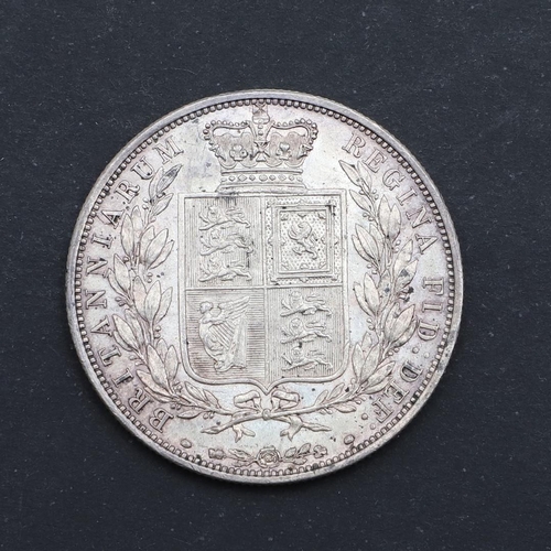 596 - A QUEEN VICTORIA HALFCROWN, 1881. A Queen Victoria Halfcrown, Young bust l. dated 1881, reverse with... 