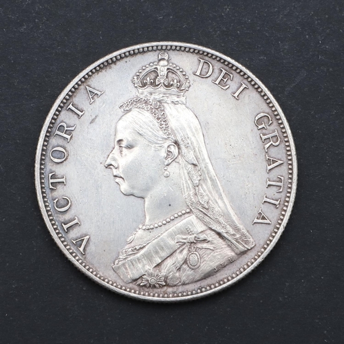 597 - A QUEEN VICTORIA DOUBLE FLORIN, 1887. A Queen Victoria Double Florin, Jubilee bust l. Reverse crowed... 