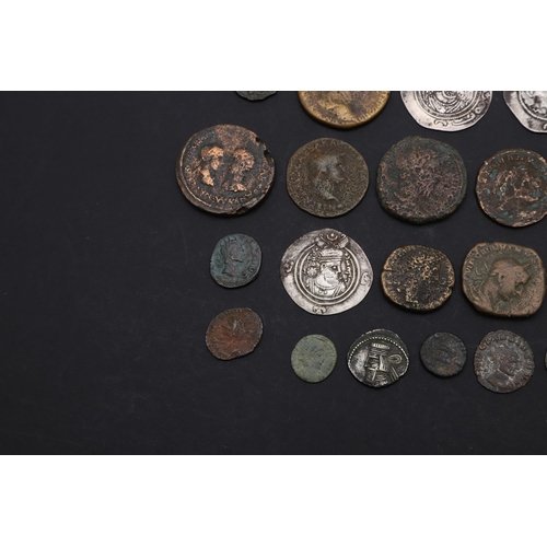 737 - A COLLECTION OF ANCIENT COINS TO INCLUDE ROMAN AND OTHERS. A collection of ancient coins to include ... 