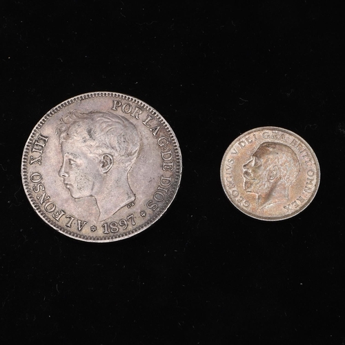 747 - A GEORGE V SHILLING, 1914 AND A SPANISH 5 PESETAS 1897. A George V Shilling, bare head, l. reverse d... 