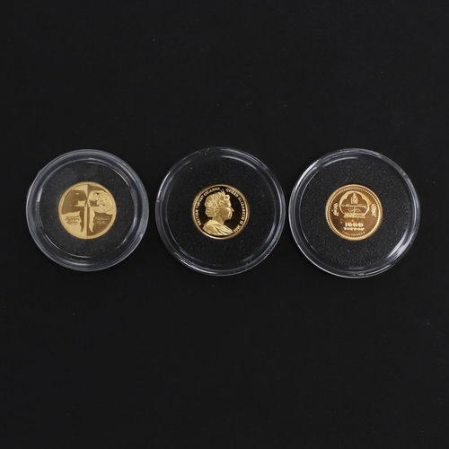 878 - THREE MINIATURE GOLD COINS. 2006. Three miniature gold coins from the 'small gold coins of the world... 