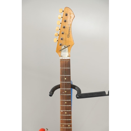 521 - FUTURAMA ELECTRIC GUITAR. A small Futurama II electric guitar with red and white body, Serial Number... 