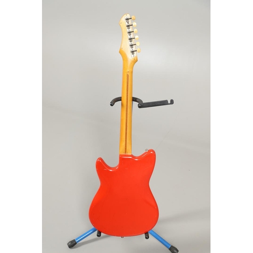 521 - FUTURAMA ELECTRIC GUITAR. A small Futurama II electric guitar with red and white body, Serial Number... 