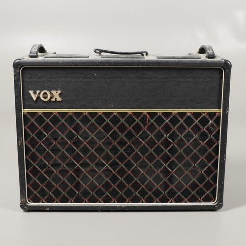 523 - LARGE VINTAGE VOX AC 30 GUITAR AMPLIFIER. A large Vox AC 30 twin guitar amplifier, Serial Number 355... 