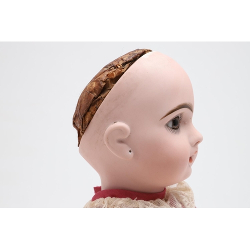 538 - FRENCH JUMEAU BISQUE HEAD DOLL. The large doll with fixed almond glass eyes, open mouth and pierced ... 