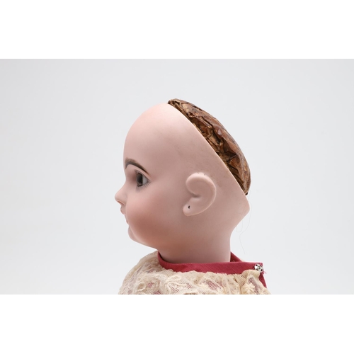 538 - FRENCH JUMEAU BISQUE HEAD DOLL. The large doll with fixed almond glass eyes, open mouth and pierced ... 