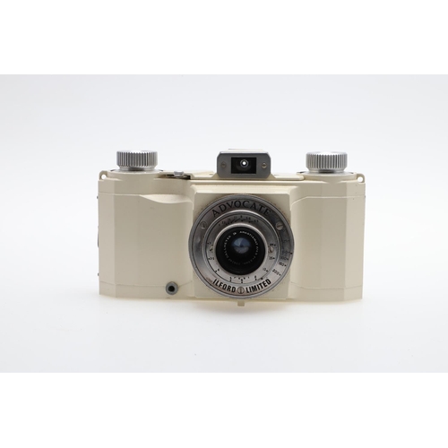 562 - ILFORD ADVOCATE CAMERA & ILFORD ACCESSORIES. An lford Advocate camera with a white body, with a Dall... 