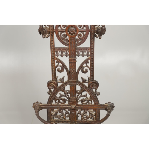 657 - A VICTORIAN FALKIRK IRONWORKS AESTHETIC MOVEMENT CAST IRON HALLSTAND. In the manner of Christopher D... 