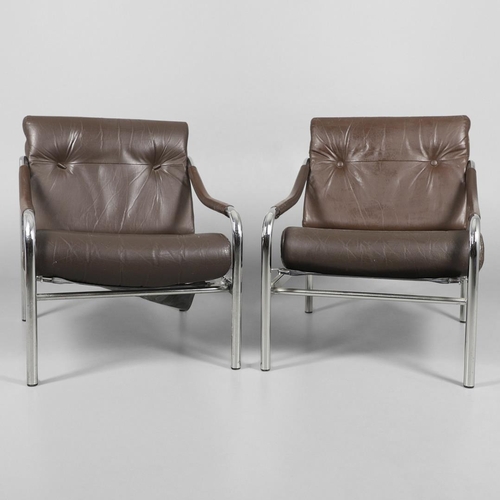 658 - PIEFF - PAIR OF DESIGNER LEATHER ARMCHAIRS DESIGNED BY TIM BATES. A pair of brown leather armchairs ... 