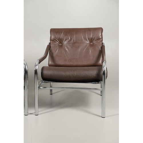 658 - PIEFF - PAIR OF DESIGNER LEATHER ARMCHAIRS DESIGNED BY TIM BATES. A pair of brown leather armchairs ... 