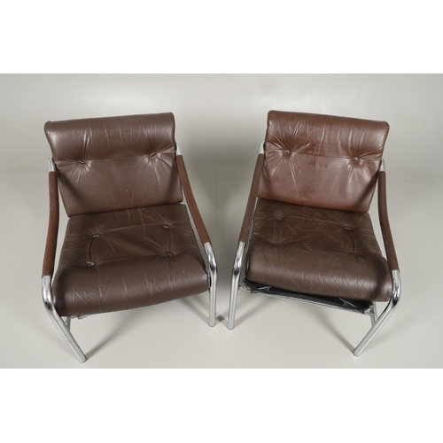 658 - PIEFF - PAIR OF DESIGNER LEATHER ARMCHAIRS DESIGNED BY TIM BATES. A pair of brown leather armchairs ... 