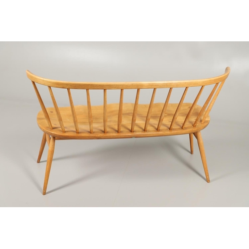 661 - VINTAGE ERCOL 'LOVE SEAT'. A vintage Ercol light elm and beech two seater 'love seat', Model No 450.... 