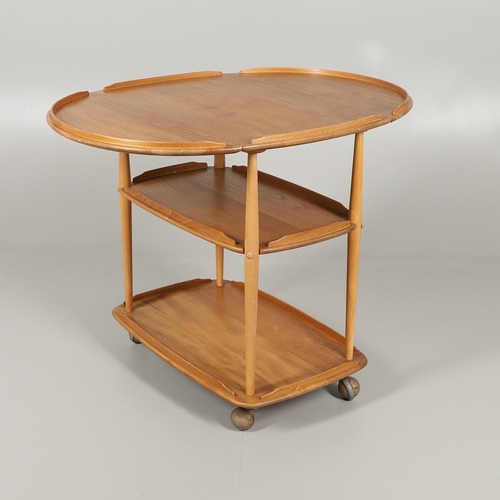 663 - ERCOL VINTAGE SUPPER TABLE & ERCOL DROP FLAP TROLLEY. The light elm and beech supper table with an o... 