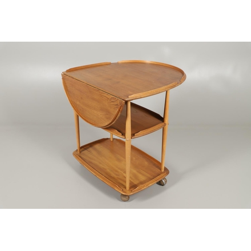 663 - ERCOL VINTAGE SUPPER TABLE & ERCOL DROP FLAP TROLLEY. The light elm and beech supper table with an o... 