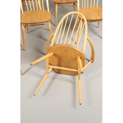 666 - SET OF ERCOL QUAKER DINING CHAIRS. A set of eight light elm and beech dining chairs, four with arms ... 