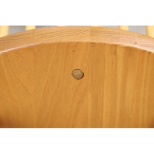 666 - SET OF ERCOL QUAKER DINING CHAIRS. A set of eight light elm and beech dining chairs, four with arms ... 