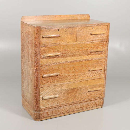 671 - HEALS STYLE LIMED OAK CHEST OF DRAWERS. A limed oak chest of drawers with a back rail and rounded co... 