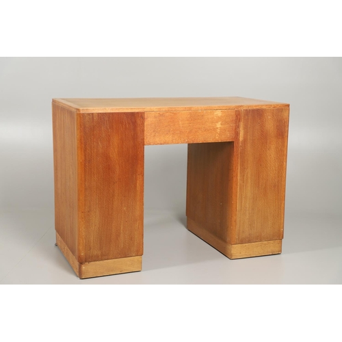 672 - HEALS OAK PEDESTAL DESK. The oak desk with three drawers above three larger drawers to each side, ma... 