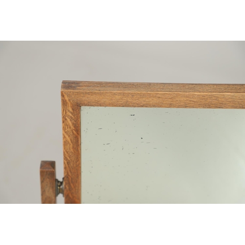 673 - HEALS STYLE OAK DRESSING TABLE MIRROR. Probably by Heals, a dressing table oak mirror, with a single... 