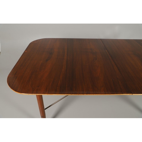 675 - ROBIN DAY FOR HILLE - 1950S ALBERMALE ROSEWOOD DINING TABLE. The rosewood veneered top with agba woo... 