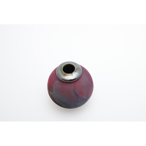 677 - ALAN WALLWORK (1931-2019) - SPLIT FORM SEED VASE. A split form seed vase, with pierced decoration, s... 