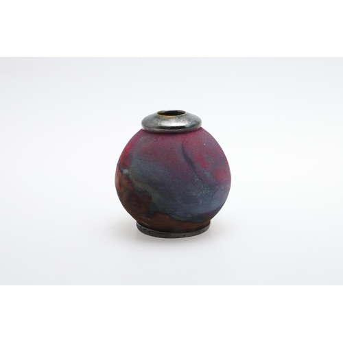 677 - ALAN WALLWORK (1931-2019) - SPLIT FORM SEED VASE. A split form seed vase, with pierced decoration, s... 