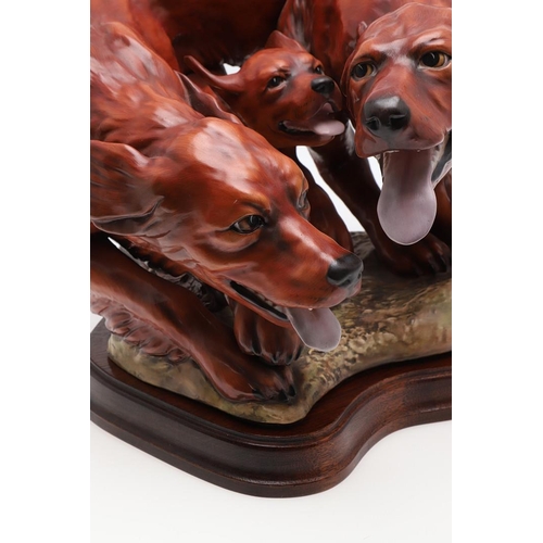 682 - MICHAEL SUTTY - RARE LARGE GROUP OF RED SETTERS. An unusually large bone china group of 'Red Setters... 