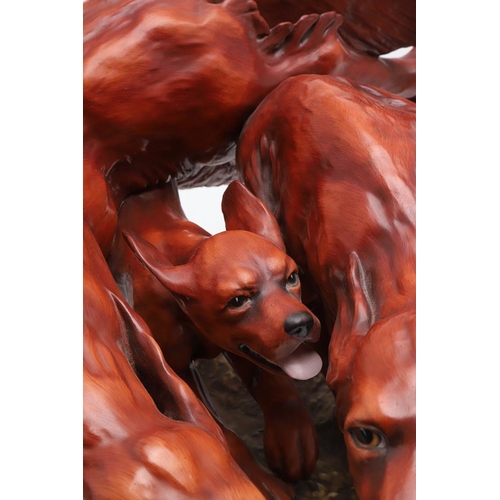 682 - MICHAEL SUTTY - RARE LARGE GROUP OF RED SETTERS. An unusually large bone china group of 'Red Setters... 