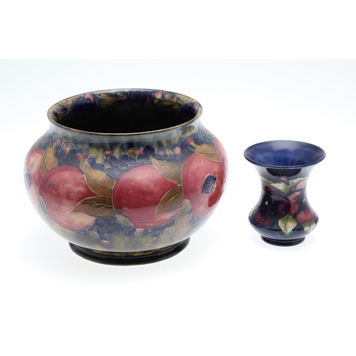 687 - EARLY MOORCROFT POMEGRANATE & MOORCROFT VASE. A early jardiniere of globular form in the pomegranate... 