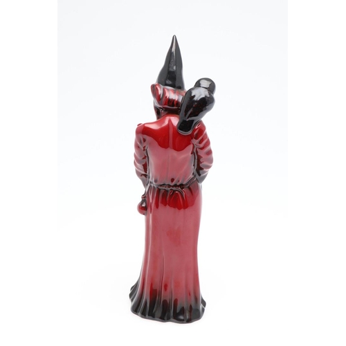 691 - A ROYAL DOULTON POTTERY FLAMBE FIGURE OF 'THE WIZARD'. A Royal Doulton model of The Wizard, HN 3121,... 