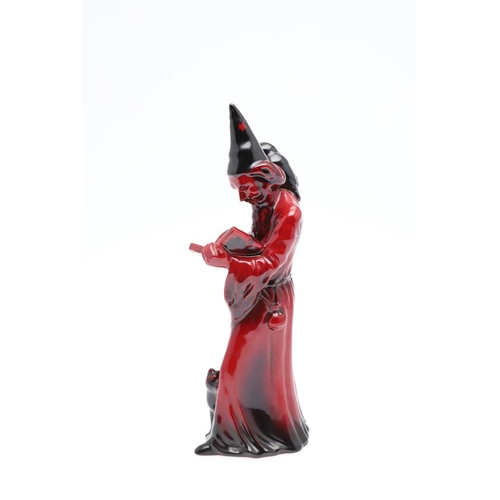 691 - A ROYAL DOULTON POTTERY FLAMBE FIGURE OF 'THE WIZARD'. A Royal Doulton model of The Wizard, HN 3121,... 