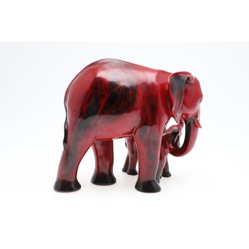 697 - ROYAL DOULTON POTTERY 'IMAGES OF FIRE' FLAMBE FIGURE OF ELEPHANTS & ANOTHER GROUP. A large Royal Dou... 